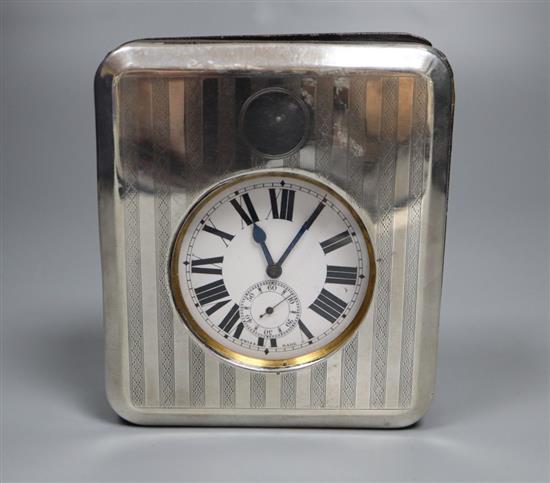 A George V silver mounted travelling watch case, with pocket watch, A& J Zimmerman, Birmingham, 1913, 11.3cm.